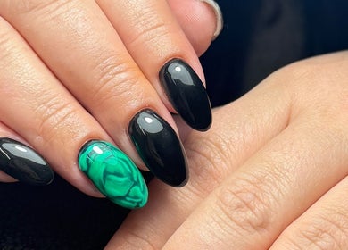 Elegant black and green nail design at Polished by Kate, Constantine, England, GB.