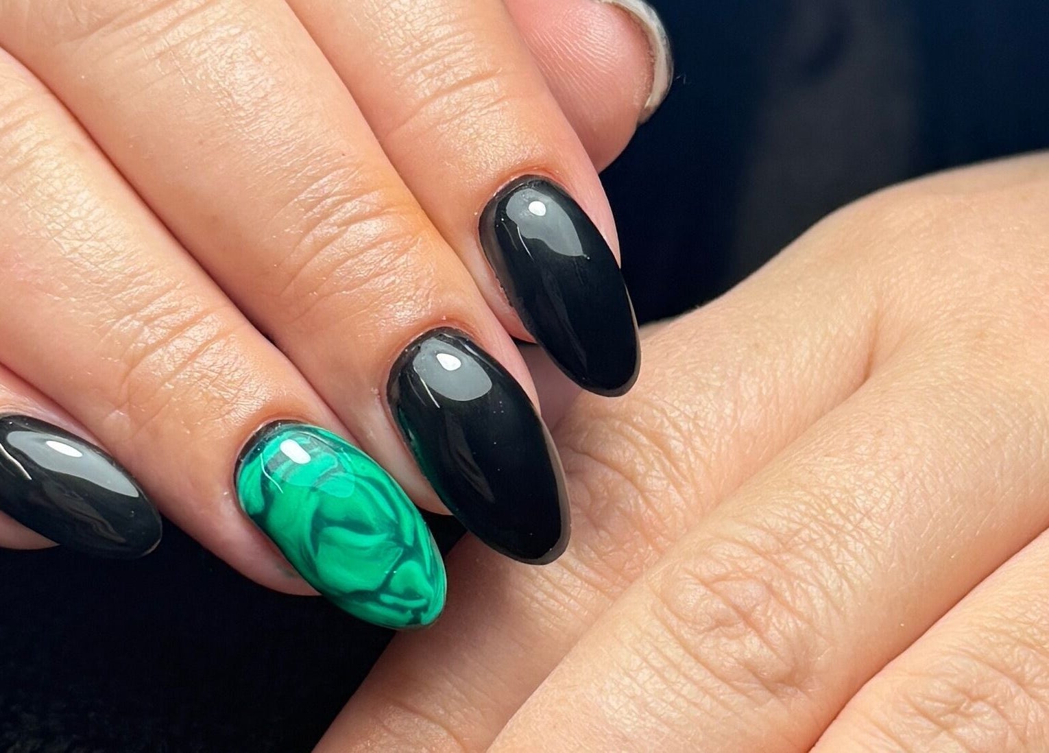 Elegant black and green nail design at Polished by Kate, Constantine, England, GB.