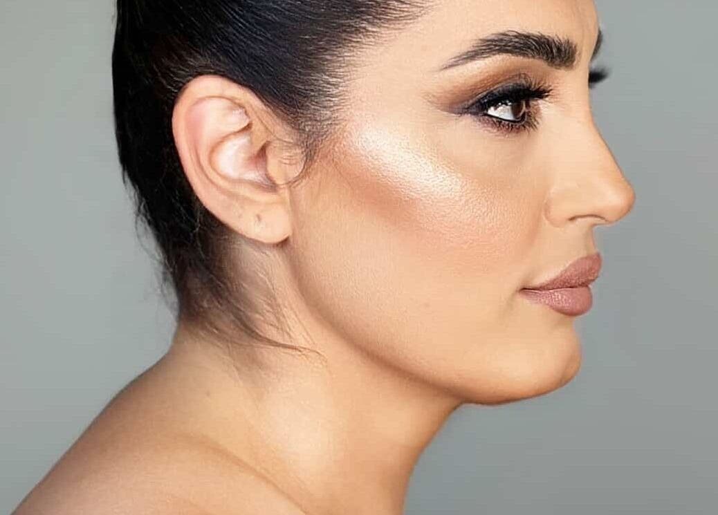 Side profile of woman with glowing skin at Cecilia Beauty Salon, Melbourne, Victoria, AU.