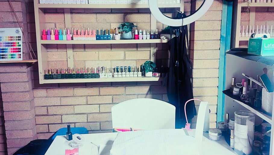 A vibrant nail polish display at Chester Hill nails and eyelash extension studio, Sefton, New South Wales, AU.