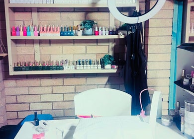 A vibrant nail polish display at Chester Hill nails and eyelash extension studio, Sefton, New South Wales, AU.