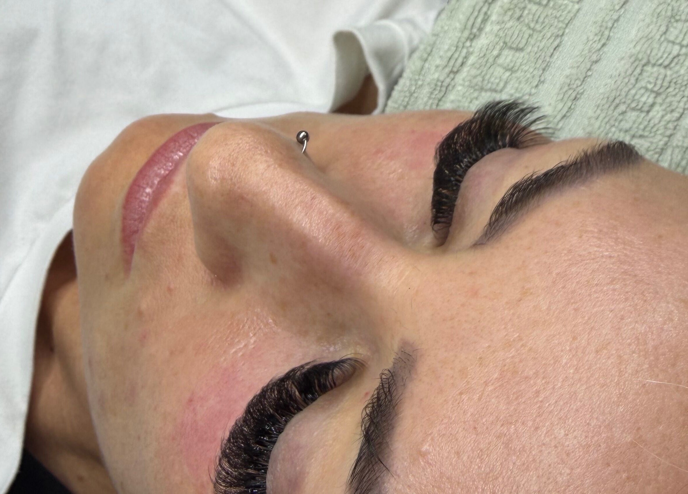 Client receives eyelash extensions at Chester Hill nails and eyelash extension studio in Sefton, New South Wales, AU.