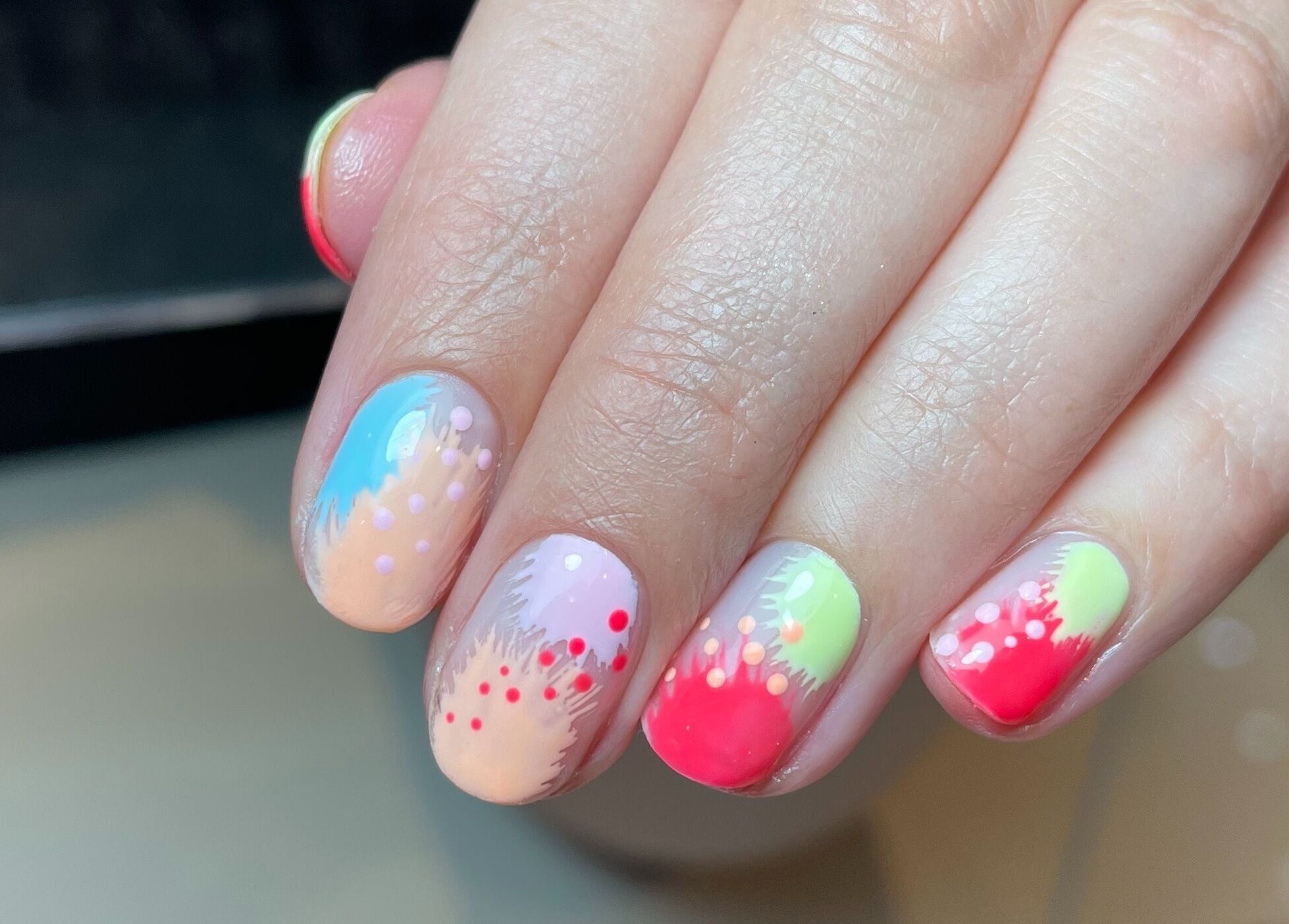 Colorful nail art at The Nail Alchemist in Knaresborough, England, GB, showcasing vibrant creative designs.