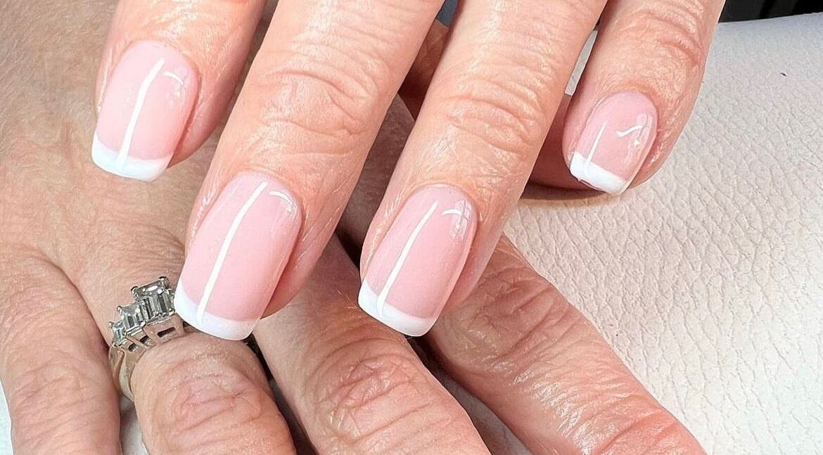 Beautiful French manicure at TLC beauty, Birtley, England, GB. Classic elegance for perfect nails.