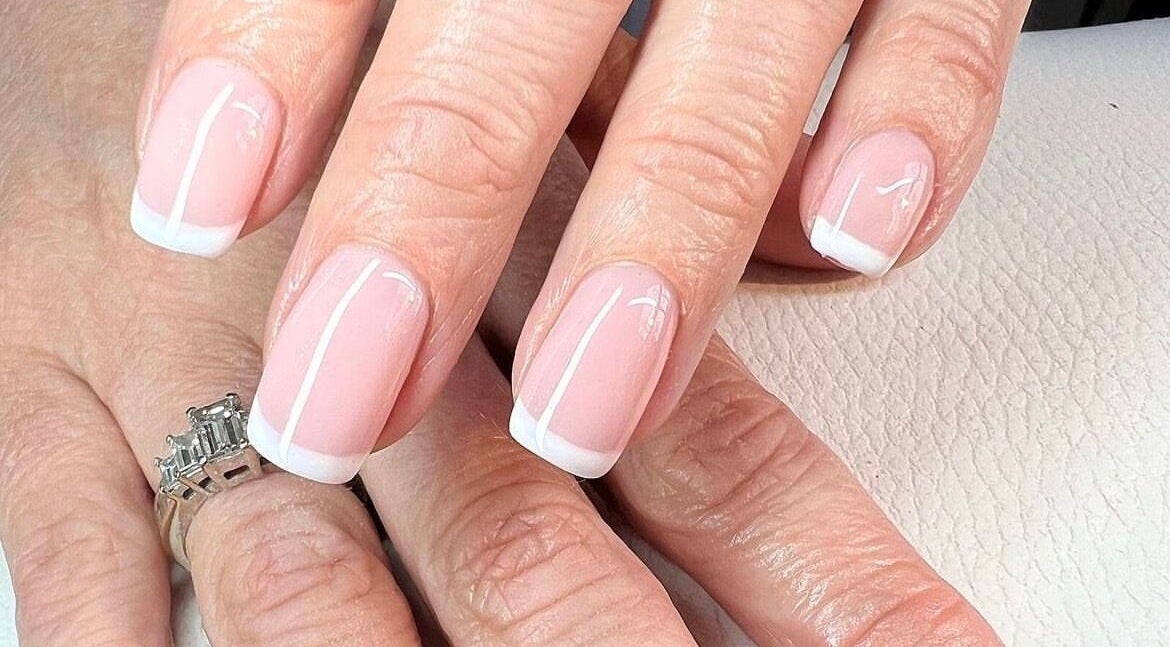 Beautiful French manicure at TLC beauty, Birtley, England, GB. Classic elegance for perfect nails.