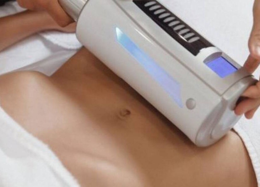 CoolSculpting treatment at MK Cosmetic Clinic in Vaughan, Ontario, CA shows body contouring in progress.