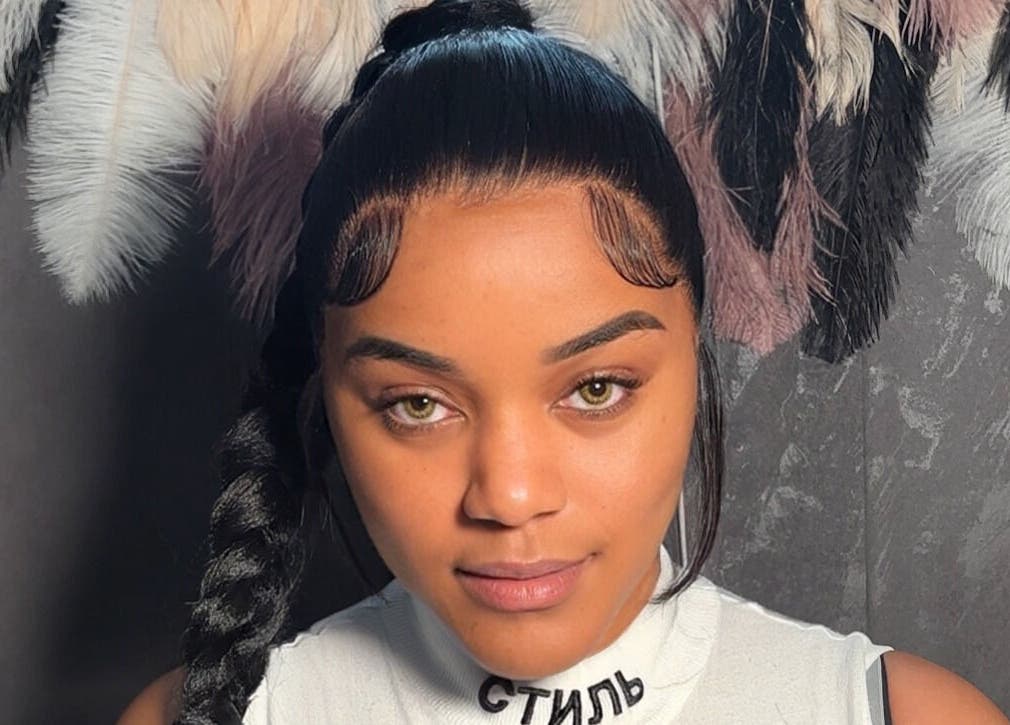 Elegant hairstyle at ChicBy.Te in Oistins, Christ Church, BB, adorned with stylish feathers.