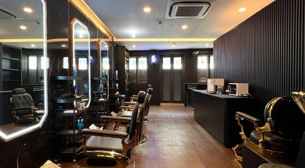 Modern interior of Platinum Cutz & Style - WEST, featuring sleek styling chairs in Bouna Vista, Singapore, SG.