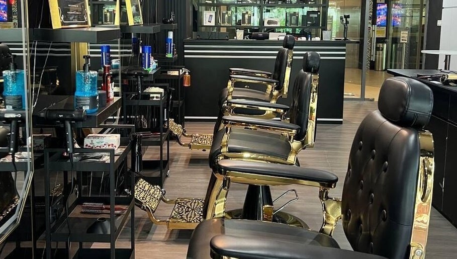 Modern barber chairs at Platinum Cutz & Style - WEST, Bouna Vista, Singapore, SG, highlighting luxury seating.