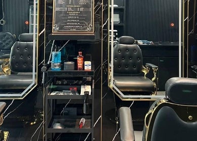 Luxurious barber chairs at Platinum Cutz & Style - WEST, Bouna Vista, Singapore, SG enhance the stylish ambiance.