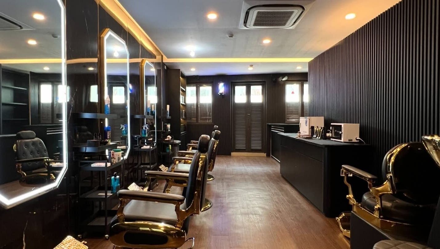 Upscale barber chairs and elegant decor at Platinum Cutz & Style - CENTRAL, Orchard, Singapore, SG.