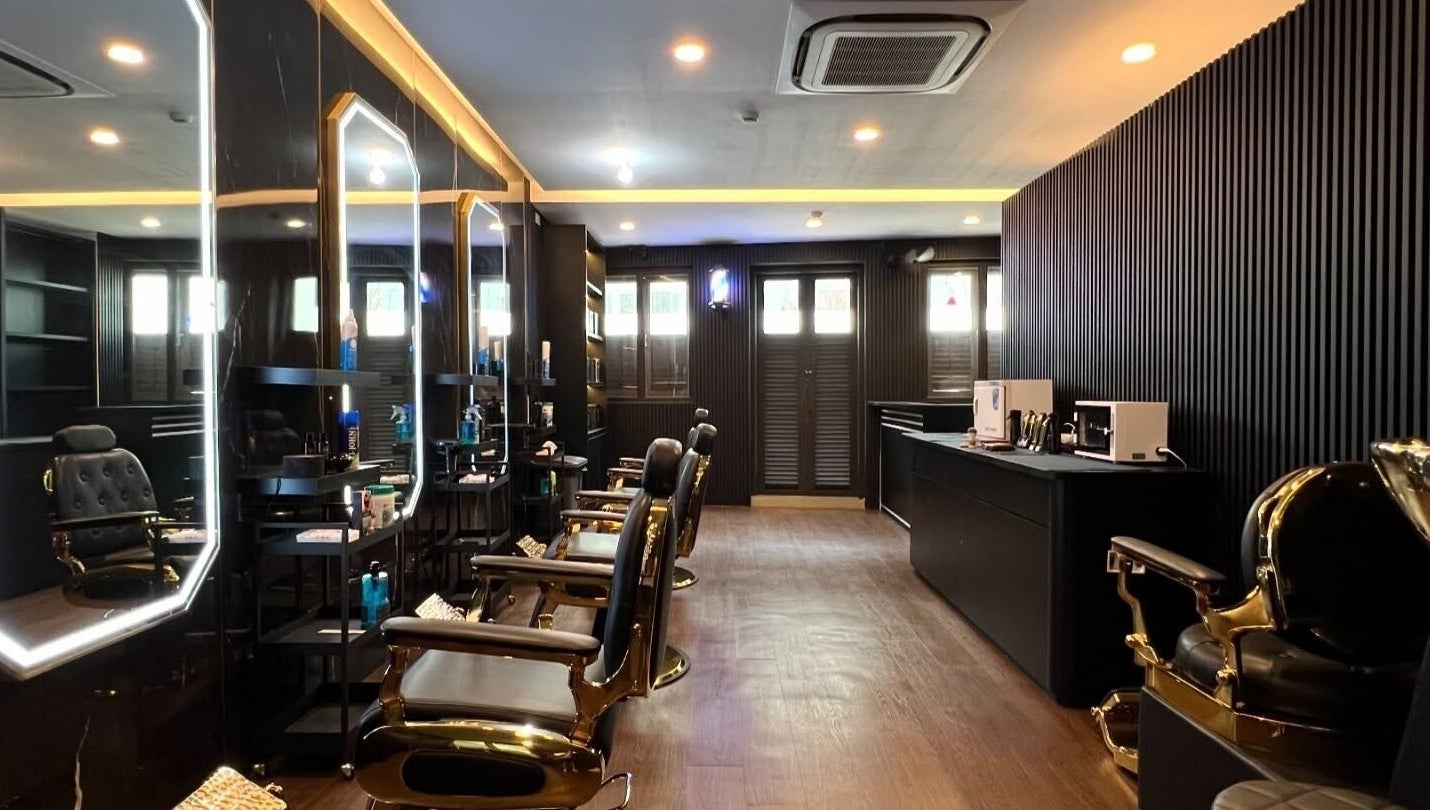 Upscale barber chairs and elegant decor at Platinum Cutz & Style - CENTRAL, Orchard, Singapore, SG.
