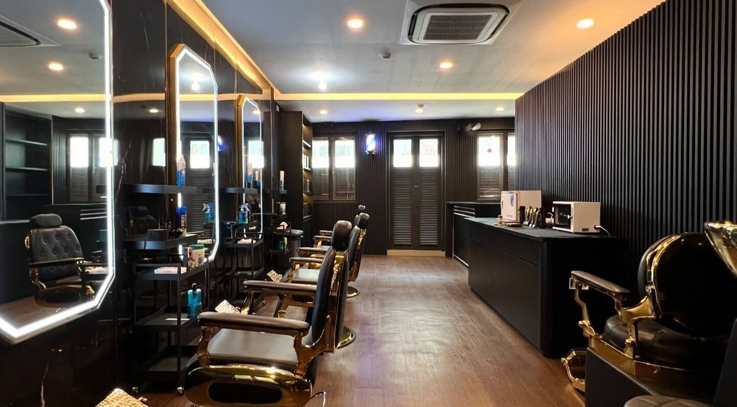Upscale barber chairs and elegant decor at Platinum Cutz & Style - CENTRAL, Orchard, Singapore, SG.