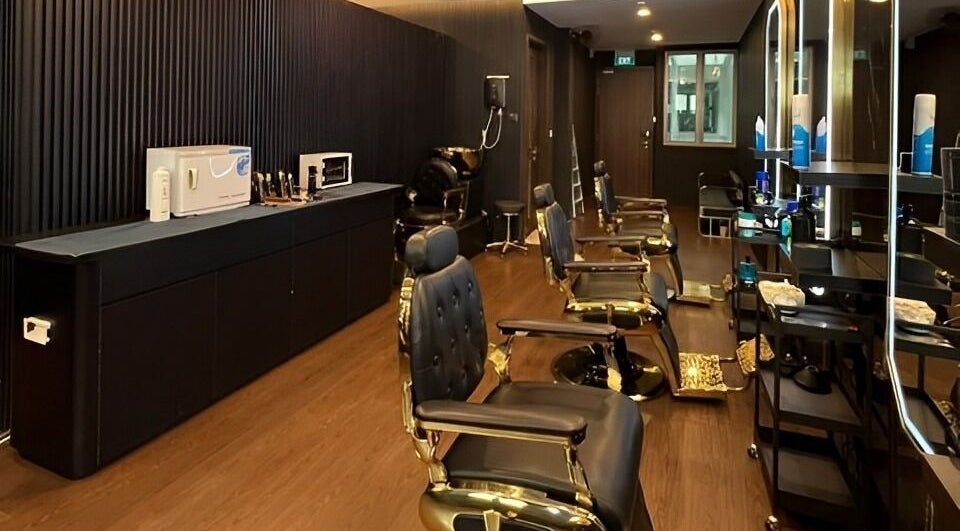 Elegant interior of Platinum Cutz & Style - CENTRAL in Orchard, Singapore, SG featuring luxurious styling chairs.