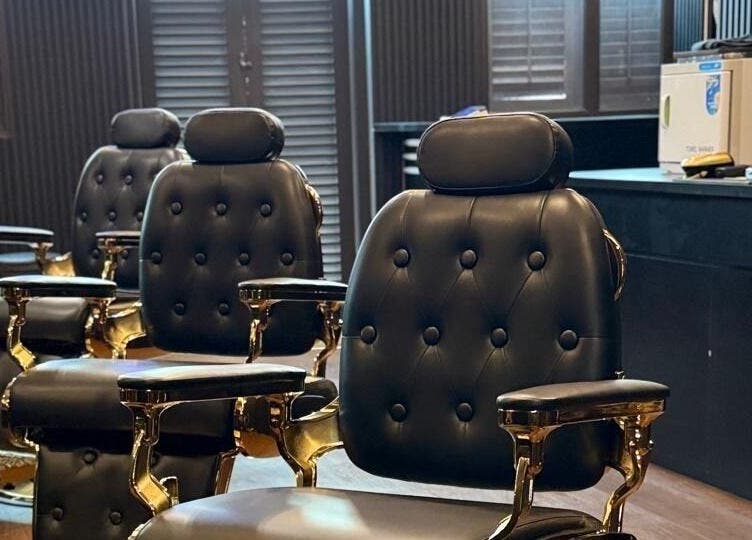 Elegant barber chairs at Platinum Cutz & Style - CENTRAL, Orchard, Singapore, SG, highlighting luxury ambiance.