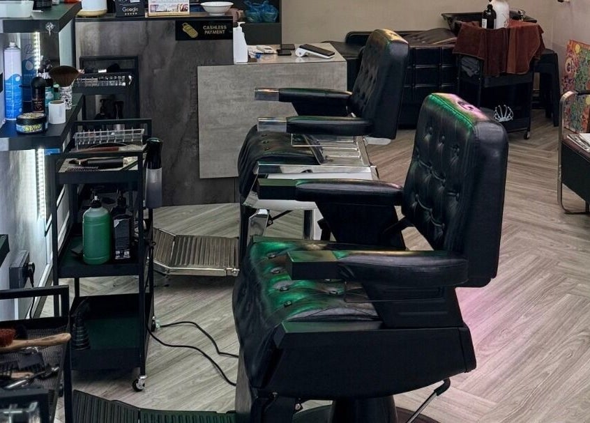 Chic interior of Platinum Cutz & Style - EAST at Marine Parade, Singapore showcasing modern salon chairs and decor.