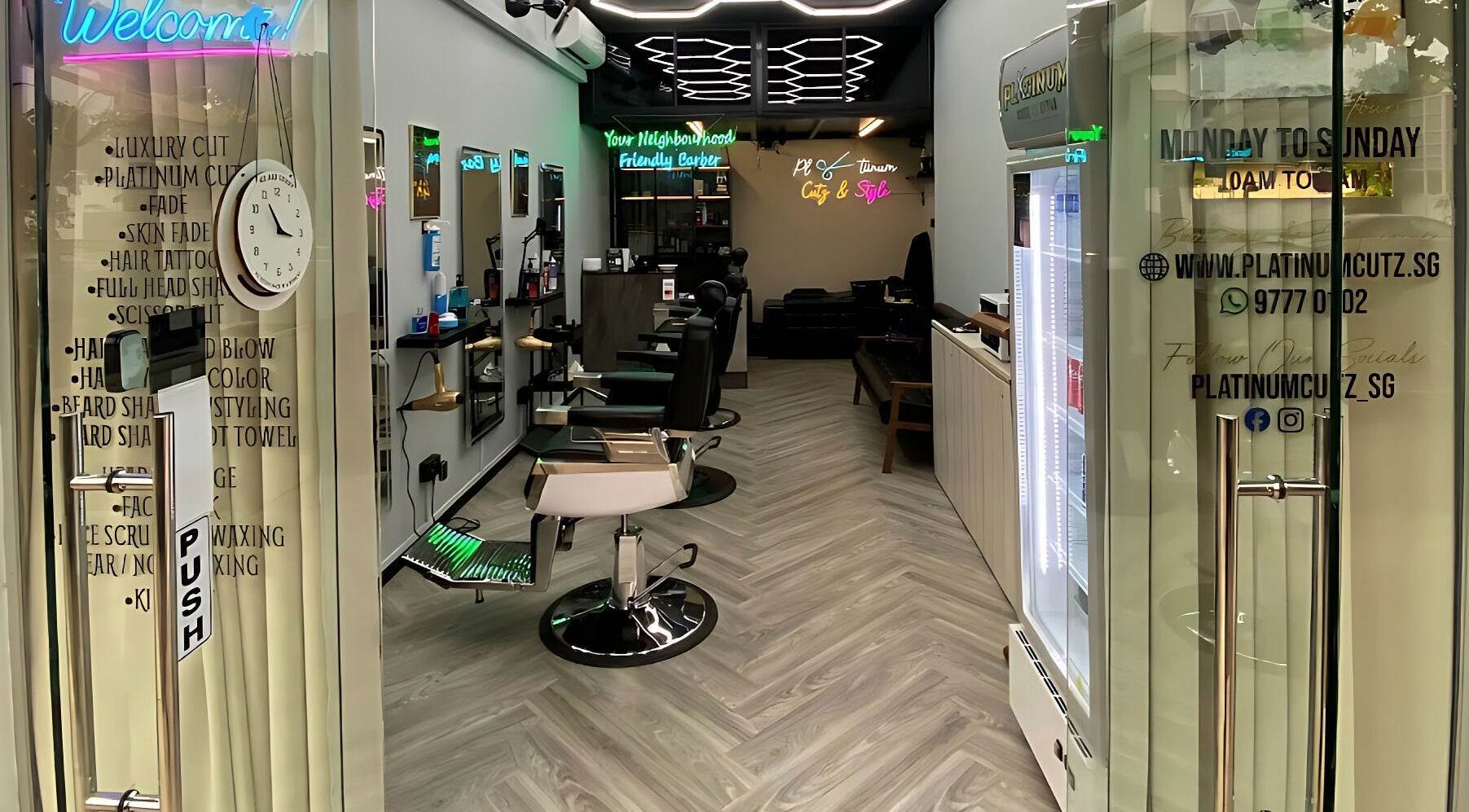 Interior of Platinum Cutz & Style - EAST at Marine Parade, Singapore, showcasing modern salon design and seating.
