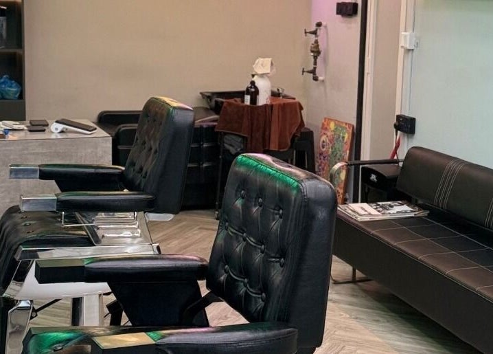 Modern barber chairs and seating area at Platinum Cutz & Style - EAST, Marine Parade, Singapore, SG.