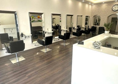 V Hair Salon Bondi interior with stylish chairs and mirrors, Bondi, New South Wales, AU.
