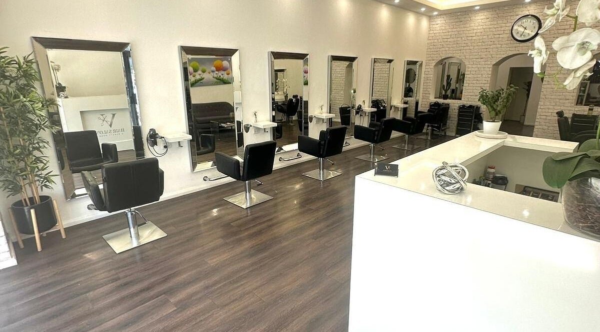 V Hair Salon Bondi interior with stylish chairs and mirrors, Bondi, New South Wales, AU.