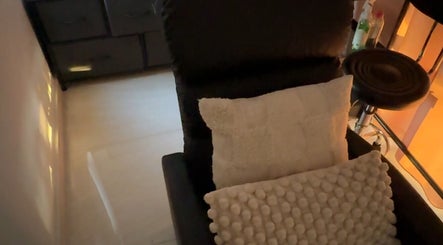 Cozy lounge chair setup at OnFleek Lash & Brows, Condell Park, New South Wales, AU.
