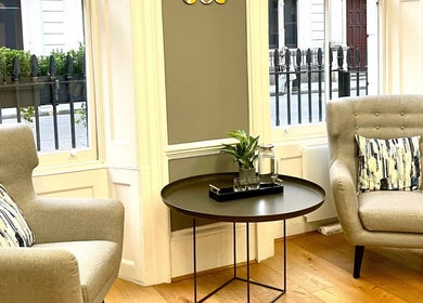 Comfortable seating area at Wellbeing Massage & Pain Relief in Covent Garden, London, England, GB.