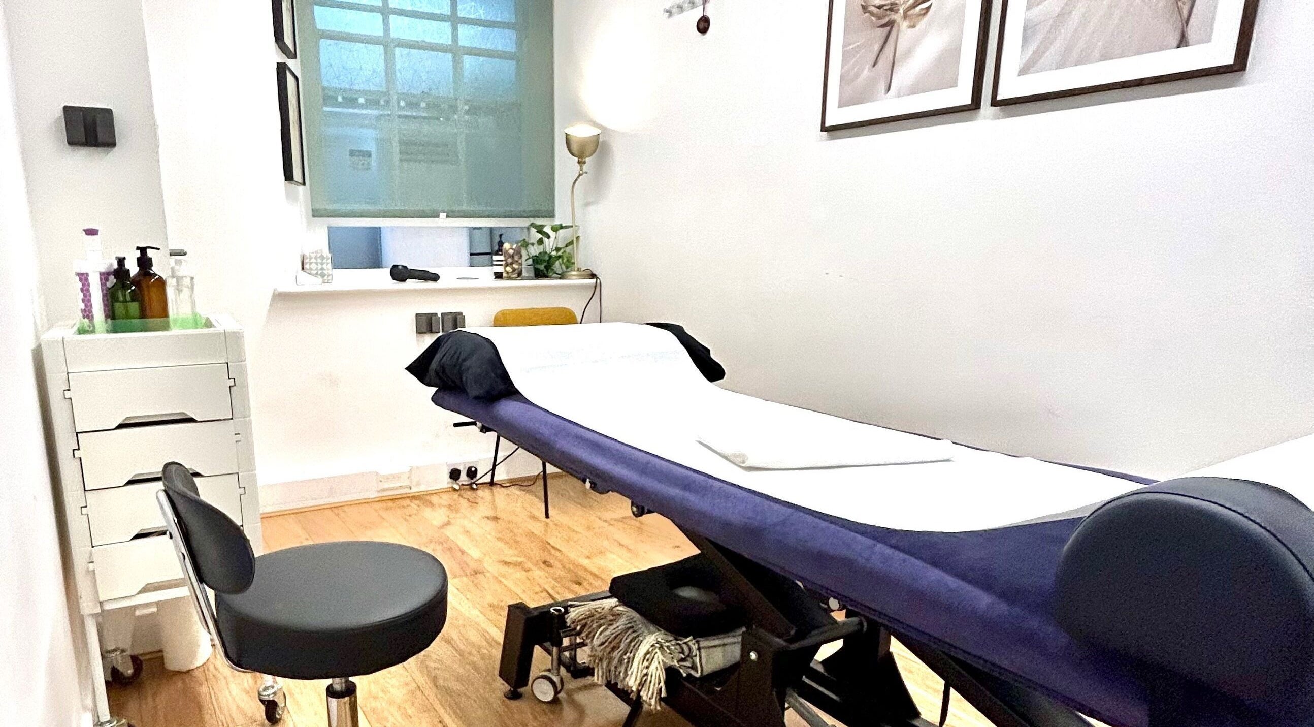 Calming massage room at Wellbeing Massage & Pain Relief in Covent Garden, London, England, GB.
