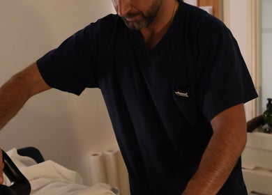 Therapist providing treatment at Wellbeing Massage & Pain Relief in Covent Garden, London, England, GB.
