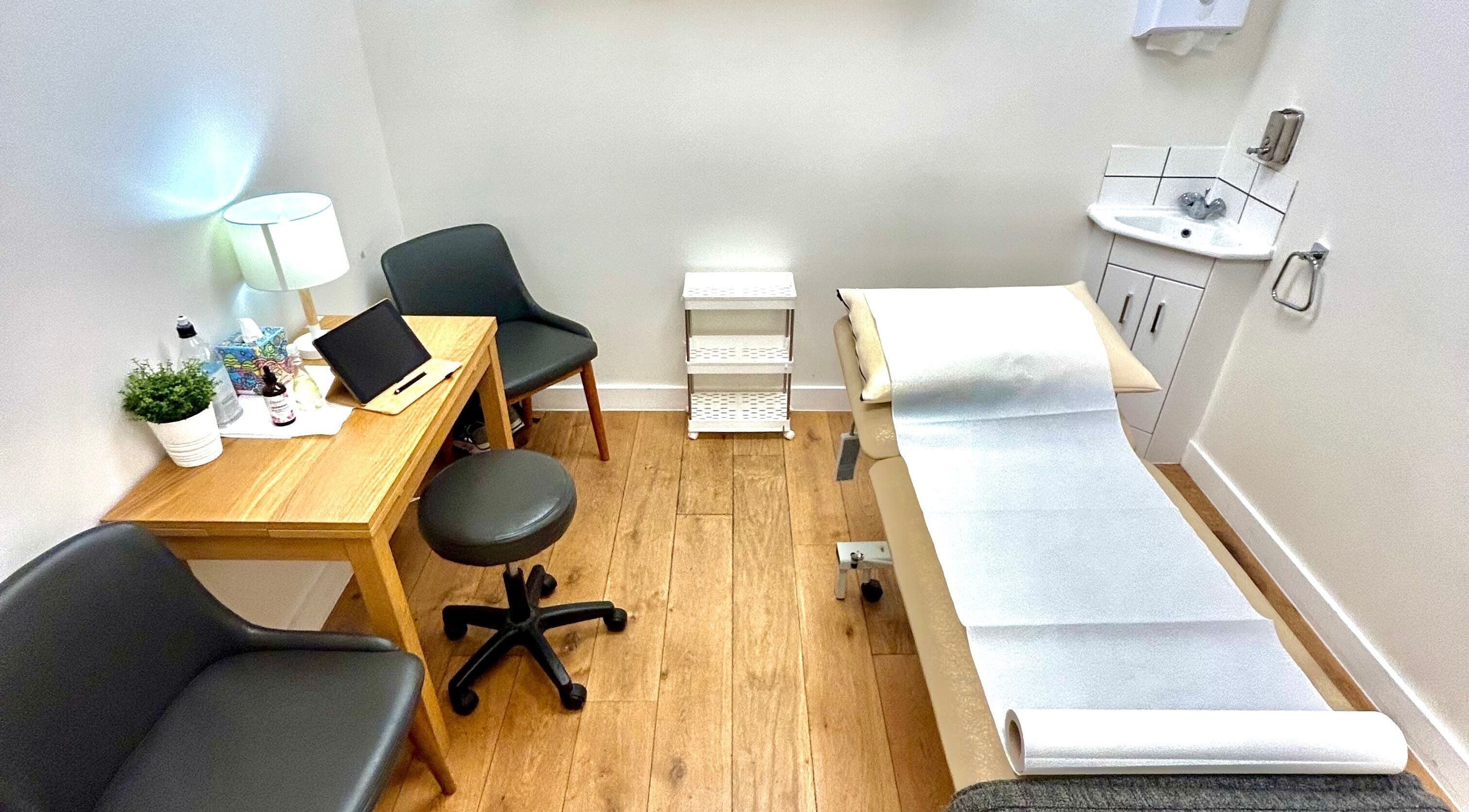 Cozy therapy room setup at Wellbeing Massage & Pain Relief in Monument, London, England, GB.