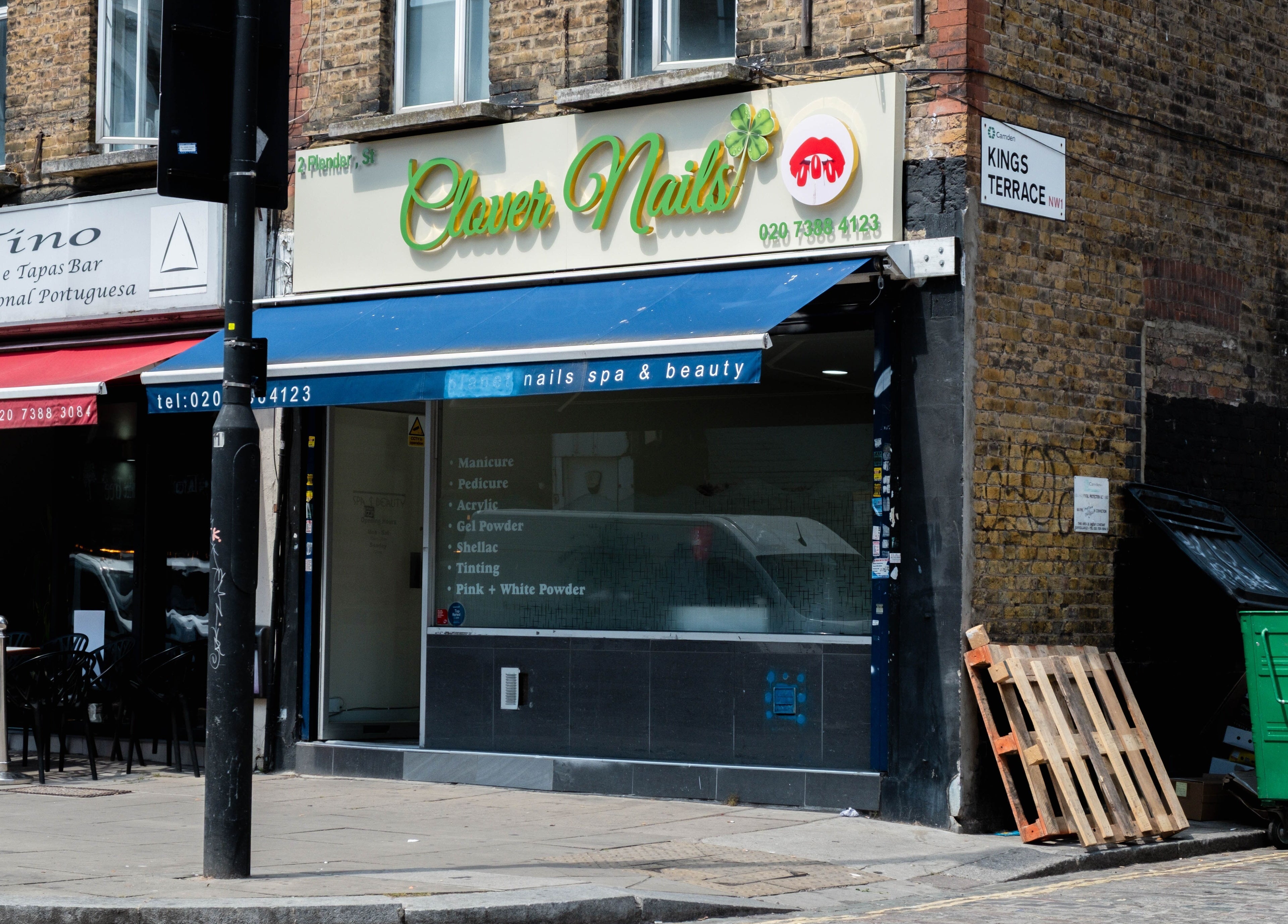 Exterior of Planet Nails in London, England, GB showcasing its modern design and inviting entrance.