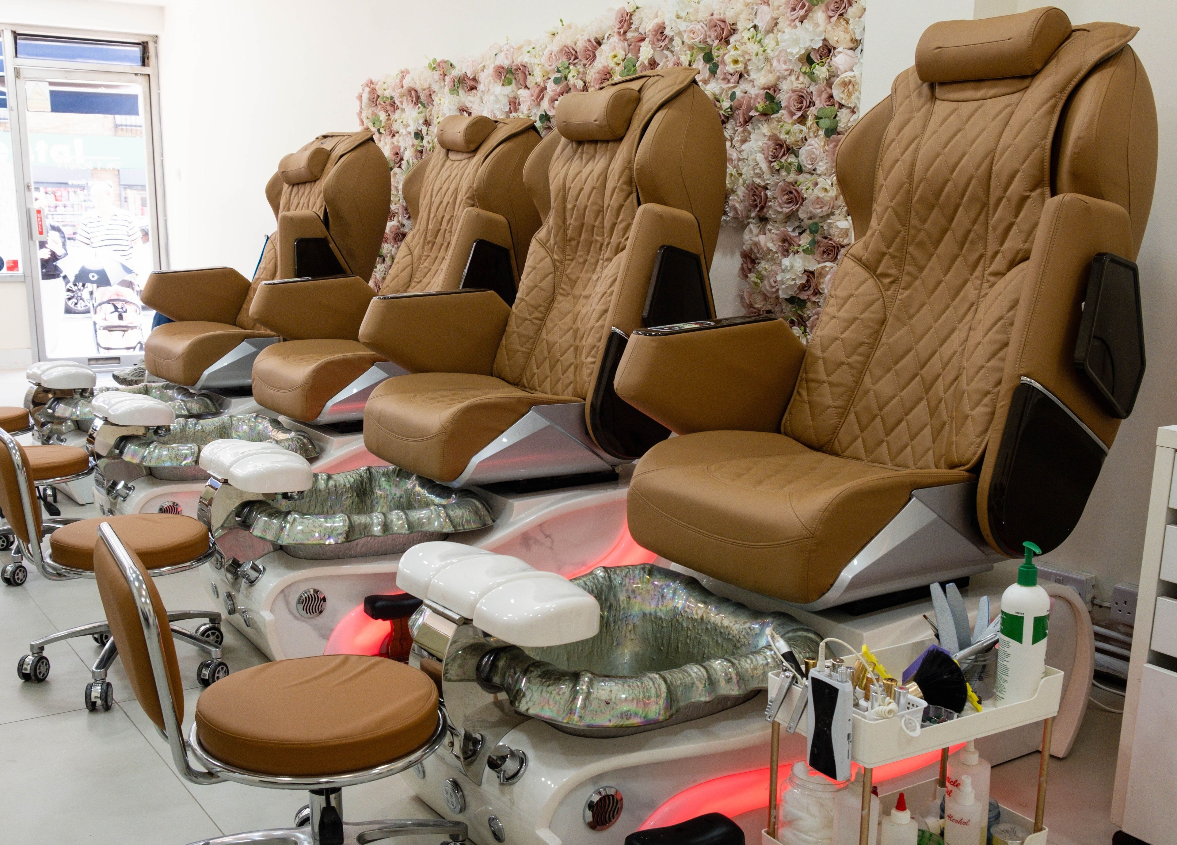 Luxurious pedicure chairs at Planet Nails in London, England, GB, offering comfort and style for clients.
