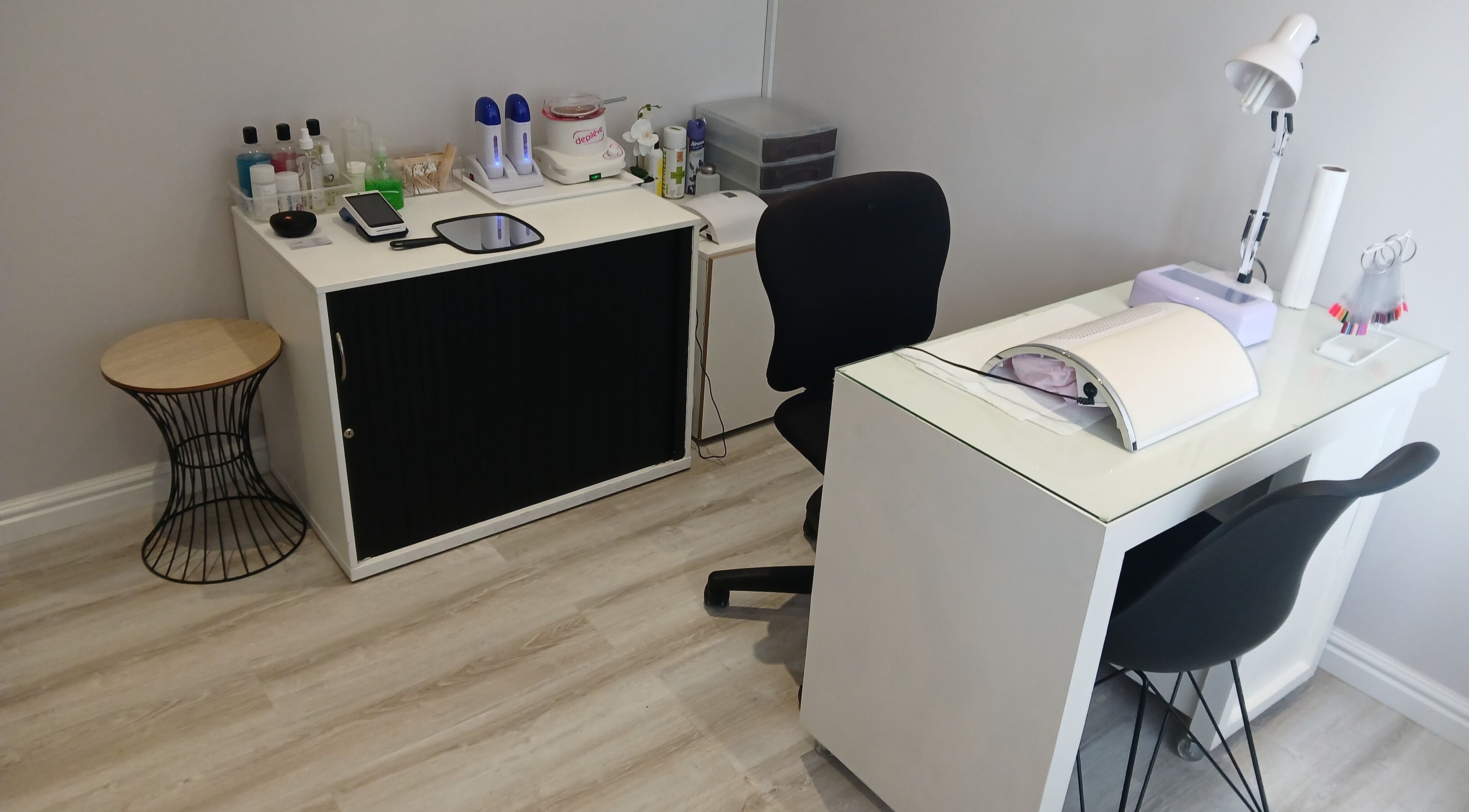 Modern nail station at Exclusive Beauty, Cape Town, Western Cape, ZA, featuring elegant decor and tools.