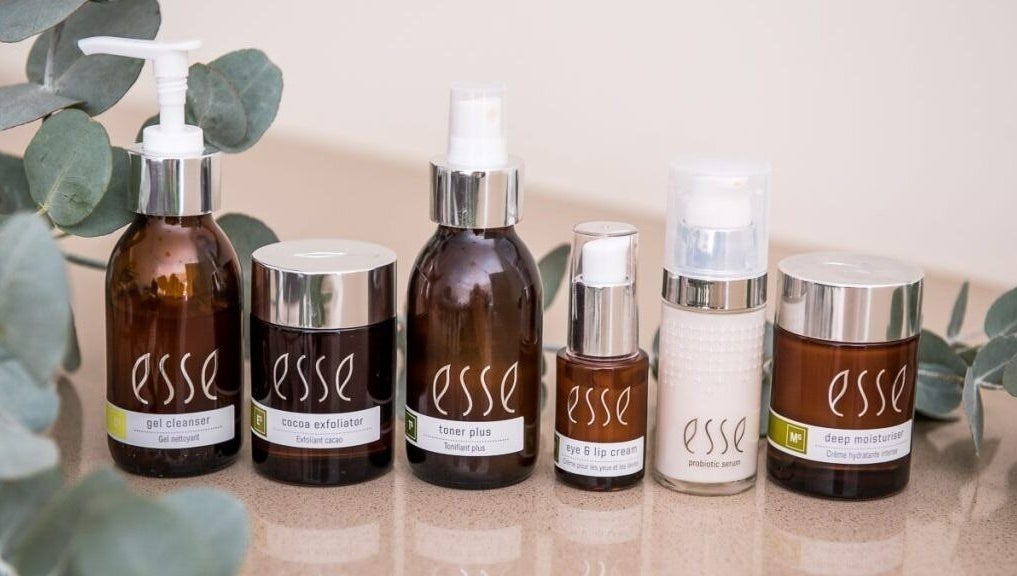 Natural skincare products on display at KreaSkin, Emanzimtoti, Kwazulu-natal, ZA, featuring lush foliage.