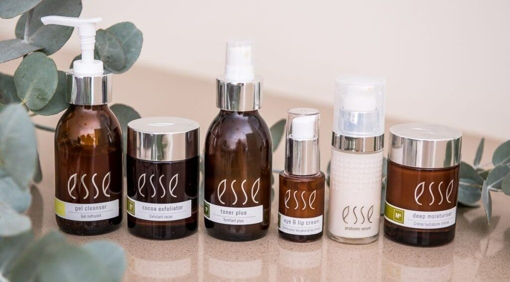 Natural skincare products on display at KreaSkin, Emanzimtoti, Kwazulu-natal, ZA, featuring lush foliage.