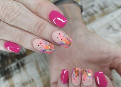 Colorful nail art with pink and abstract design at Casey's Place Of Beauty, Pinetown, KwaZulu-Natal, ZA.