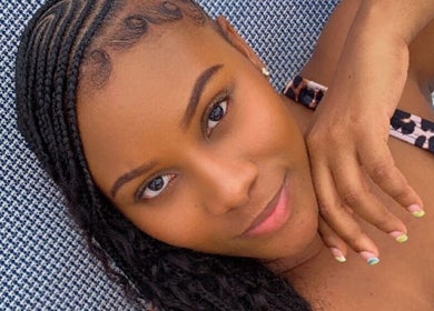 Elegant braided hairstyle at Kay’s Braiding in Portmore, St. Catherine Parish, JM.