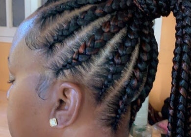 Elegant braided hairstyle done at Kay’s Braiding, Portmore, St. Catherine Parish, JM.