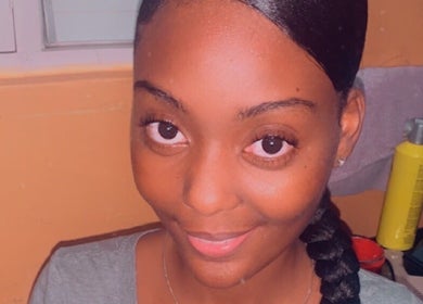 Woman with sleek braid at Kay’s Braiding, Portmore, St. Catherine Parish, JM.
