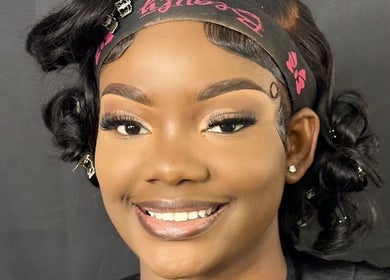 Smiling woman with styled hair at The Beauty Gallery, Marsh Harbour, Central Abaco, BS.