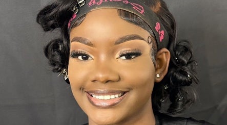 Smiling woman with styled hair at The Beauty Gallery, Marsh Harbour, Central Abaco, BS.
