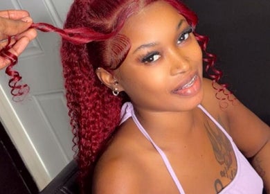 Stylish red curls hairstyle at The Beauty Gallery, Marsh Harbour, Central Abaco, BS.