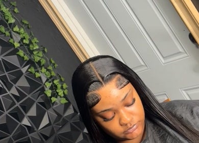 Elegant hairstyle at The Beauty Gallery, Marsh Harbour, Central Abaco, BS, featuring sleek styling and decor.