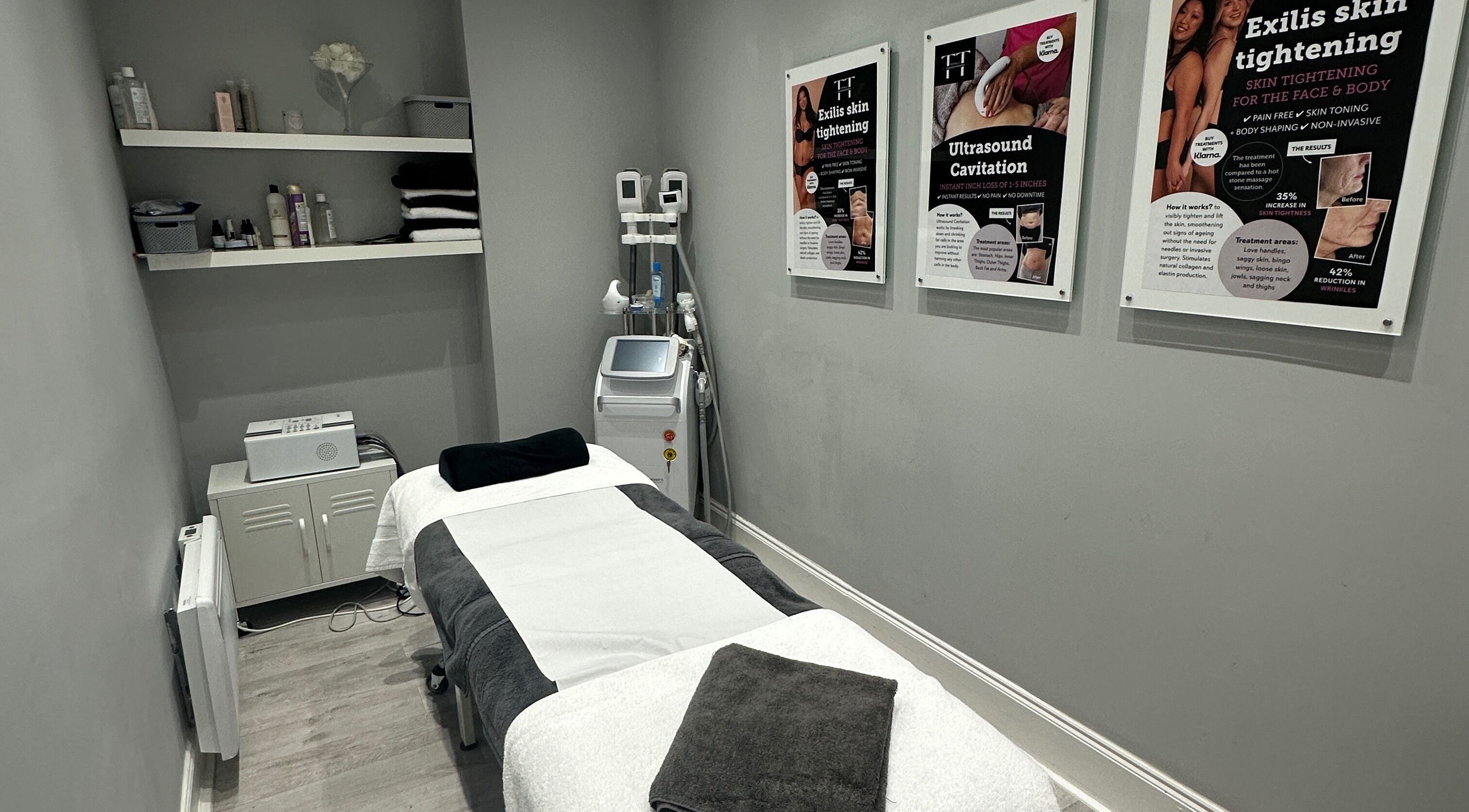 Calm therapy room at Totally Transformed, Newcastle upon Tyne, England, GB, featuring treatment bed and skincare products.