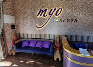 Reception area at Myo Thai Spa in Ooty, Tamil Nadu, IN with elegant décor and comfortable seating.