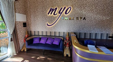 Reception area at Myo Thai Spa in Ooty, Tamil Nadu, IN with elegant décor and comfortable seating.