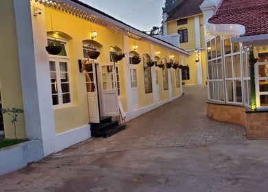 Elegant entrance of Myo Thai Spa in Ooty, Tamil Nadu, IN with warm lighting and inviting decor.