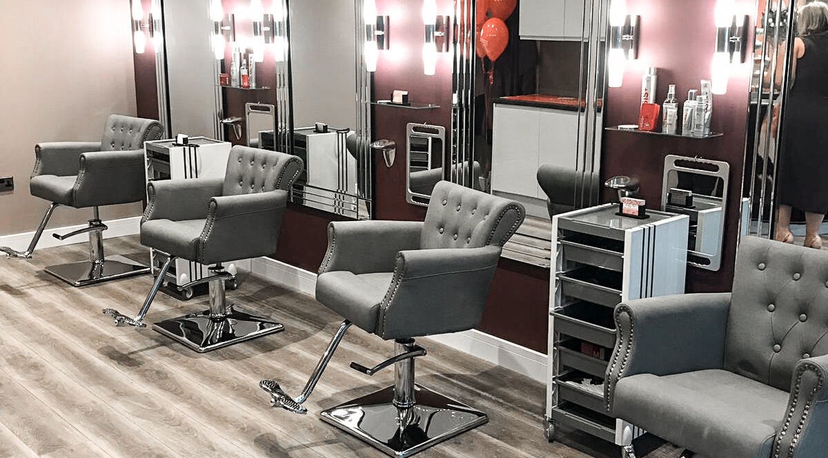 Modern styling chairs at Nikki's Hair and Beauty Salon, Kidderminster, England, GB, showcasing elegance.