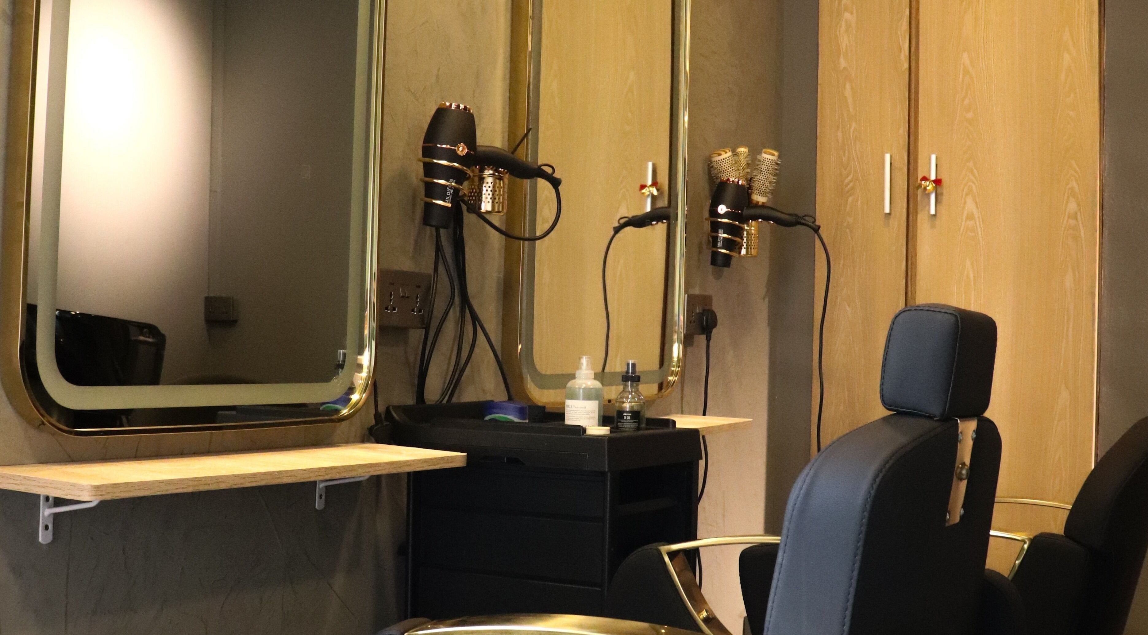 Modern salon station at Aesthe in Port Louis, Port Louis District, MU with styling tools and mirrors.