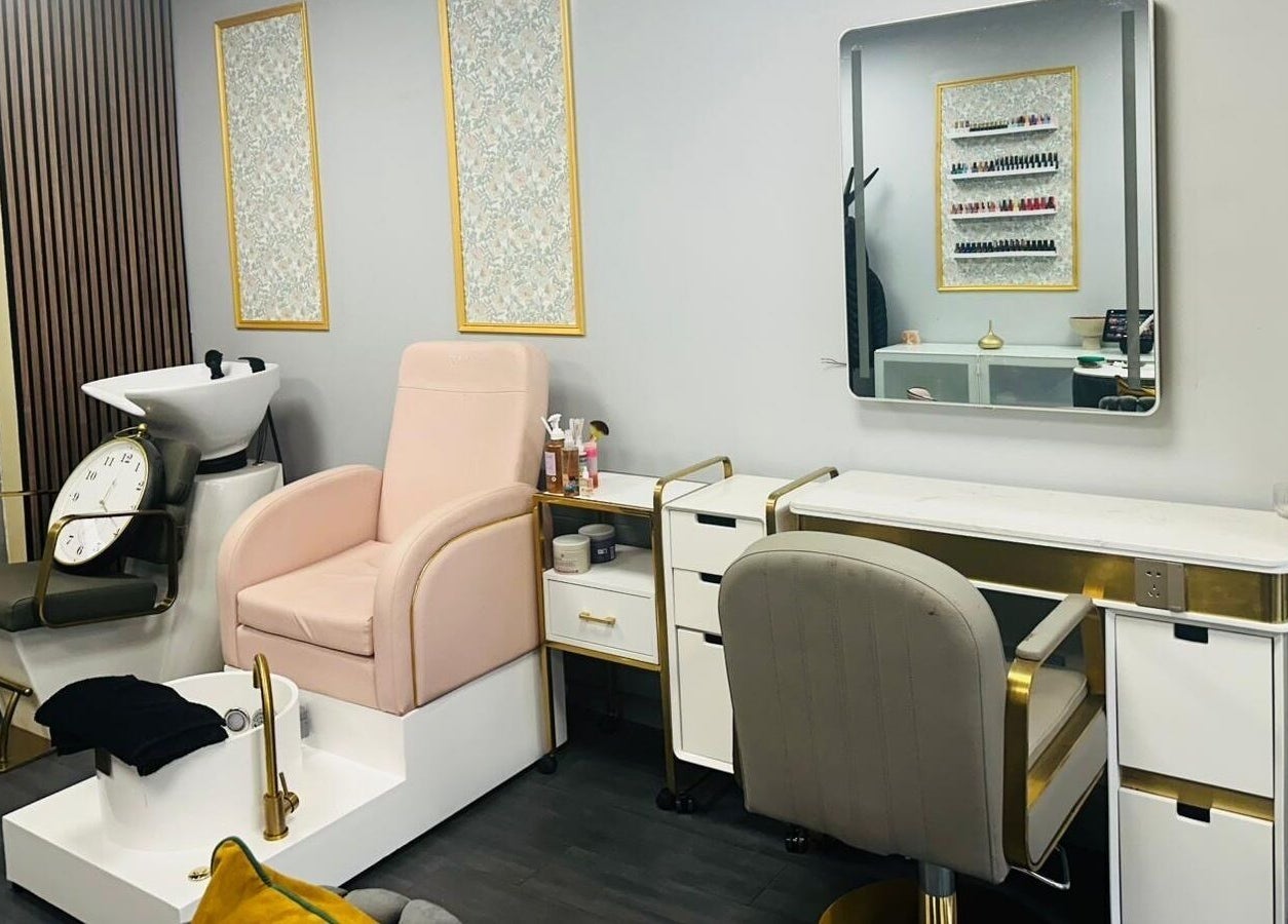 Elegant treatment area at Naina Brow Bar, Dublin7, County Dublin, IE with plush chairs and modern decor.