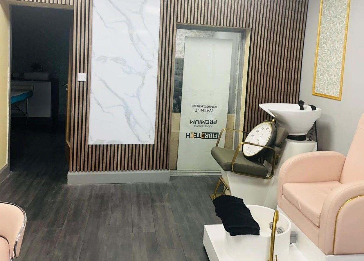 Relaxing interior at Naina Brow Bar in Dublin7, County Dublin, IE with plush seating and elegant decor.